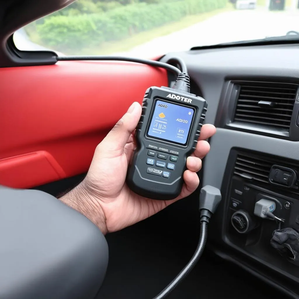 OBD2 Scanner in hand