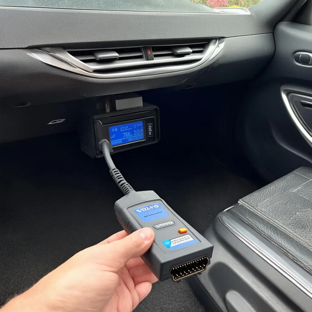 OBD scanner plugged into a Volvo