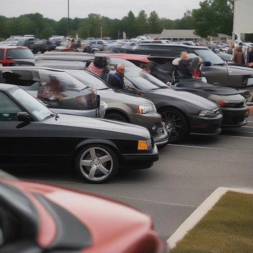 A gathering of car enthusiasts at Cars and Coffee Morrisville