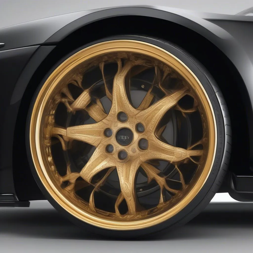 A close-up of the gold rims on a black car, showcasing the elegant contrast. 