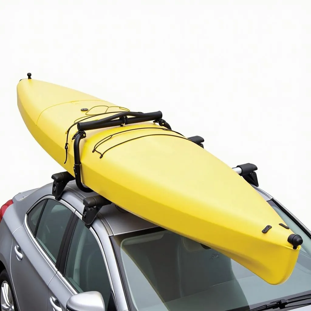 J-style kayak carrier mounted on car