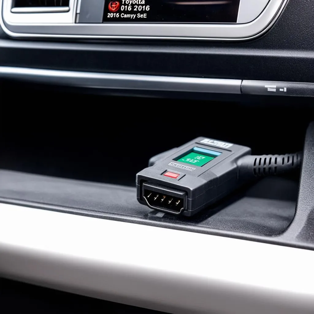 OBD scanner connected to a Toyota Camry