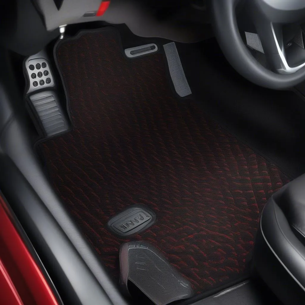 Red and black car mats in a stylish car interior